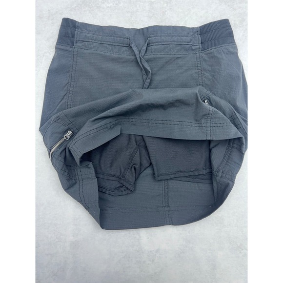 Athleta Skort Black Cargo Pockets Athletic Drawstring Waist Size 2 - Picture 3 of 4